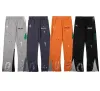 Pantaloni sportivi jeans firmati da uomo Pantaloni sportivi dritti in denim slim Pantaloni con stampa di lettere maculate Pantaloni da donna casual allentati e versatili di High Street