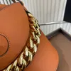 Bolso de diseñador Bolso de mujer Bolso de un solo hombro Decoración de cadena Diseño circular Bolso tipo cubo con correa Bolso de mano marrón de cuero Monedero Bolso Baguette para salir