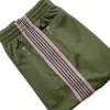 Męskie designerskie spodnie sportowe moda przyczynowe spodnie szerokie nogawki dla mężczyzn spodnie dresowe spodnie do joggingu główna ulica Hop Hip odzież wierzchnia spodnie czarna zieleń wojskowa Streetwear FJ03