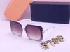 Através do atacado 2023 Design de moda Os óculos de sol sem aro para homens mulheres de verão praia de sol, conduzindo óculos de sol Goggle Modelo de Mulher Oversized 8799