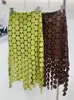 Spódnice TwotWinstyle wycięte spódnicę dla kobiet Patchwork Patchwork Tassel Nieregularny harm solidne spódnice Midi Styl ubrania letnie 230327