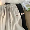 Pantaloncini da uomo Pantaloncini casual Uomo Estate Sottili Pantaloni da jogging ad asciugatura rapida Al ginocchio Alla moda Allentato All-match Toppe belle Harjauku Quotidiano Elegante Uomo W0327