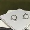 Роскошные дизайнерские серьги серебряных шпильков для женщин брендская мода Классическая буква g Серьера ювелирные ушные ушные ожерелья Обручальные ожерелья 2303285bf