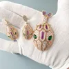Designer Collection Style Earrings Necklace Inlay Purple Diamond Hollow Out Plated Gold Color Green Eyes Snake Head Pendant Serpent Snakelike Jewelry Sets