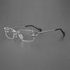 Högkvalitativ fashionabla solglasögon Mäns lyxdesigner Kvinnors solglasögon Fashion Frameless Simple Pure Titanium Business Myopia Lens Frame