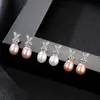 Pendientes de tuerca de plata s925 con perla x-letra de circón brillante europeo, pendientes exquisitos elegantes a la moda para mujer, regalo de joyería de lujo