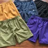 Shorts masculinos A mesma cabeça de macaco bordado shorts de etiqueta pequena com forro de malha calças de cinco pontos para homens e mulheres T230328