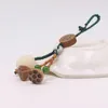 Porte-clés Naturel Blanc Jade Bodhi Graine Sculpture Lotus Mobile Téléphone Pendentif Peach Pod Porte-clés Pour Hommes Et Femmes