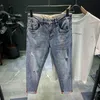 Mäns jeans rippade denim jeans män trendiga varumärke Loose Summer Thin Elastic Feet Pants Men's Korean Harem Teenagers Croped Pants 230329