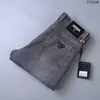 2023 dernière liste jeans skinny hommes Triangle étiquette lettres motif étiquette imprimé floral pantalon en jean hommes mode Designer Hip Hop taille 29-40