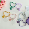 Mobiele telefoons riemen schattige siliconen armband hart hanger kawaii mobiele telefoon lanyard zachte anti-kosten pols ornament universele telefoon met riem 500 stcs