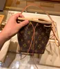 2023 Designer Bag Old Flower Women's Bag Leather Versatile One Shoulder Crossbody Bags DrawString Mini Bucket Bag Fashion Crossbody Bag Tote Bags Ryggsäck