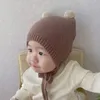 Czapki czapki topi bayi szydełko mumim semi dingin pompom perrempuan laki laki lembut czapka warna solid rajutan telinga hangat pelindung 230328