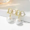 Tempérament élégant simulé perle boucles d'oreilles pour femmes Design élégant Simple accessoires délicats bijoux de mode