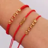 Bedelarmbanden dik creatief ontwerp onregelmatige koperen kralen rood zwart touw trekken armband voor vrouwelijke mannen handgemaakte knopen draad