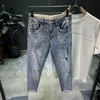 Mäns jeans rippade denim jeans män trendiga varumärke Loose Summer Thin Elastic Feet Pants Men's Korean Harem Teenagers Croped Pants 230329