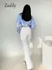 Camicette da donna Camicie Zadily Camicia bianca a maniche lunghe coreana primavera Bottone sexy da donna Taglio da donna Top Street Abbigliamento da donna 230329