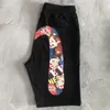 Shorts pour hommes Harajuku Y2K short de sport pour hommes short évidé décontracté marque de mode japonaise M imprimé short à jambes larges été hommes vêtements 230328