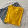 Camisa de talla grande 2023 verano estilo coreano suelta Casual manga corta mujer moda grande Color sólido cuello redondo ocio pareja camisetas