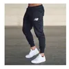 Pantaloni da uomo pantaloni slim casual jogging allenamento fitness serie di atletica leggera in primavera autunno 230328