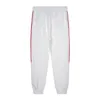 Klasyczne designerskie spodnie Modne Mężczyzn Mężczyzny Święto Spodni z literami Odznaki Haftowe spodnie do joggera Multi Pocket Spodnie Spodnie Sportowe Black White