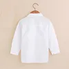 Kids Shirts Pure white baby shirt childrens clothing classic top grade childrens Tshirt cotton girl skydiving solid color student uniform 230329