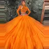Sukienki imprezowe Suknia Ball Orange Womange „Bliny Enden Eleganc