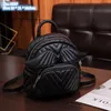 Factory wholesale ladies shoulder bags 2 colors niche design classic sewing striped handbag elegant Joker solid color leather bucket bag cute mini wing backpack