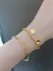 Bracciale di design di alta qualità in oro 18 carati, braccialetto d'amore fortunato, regalo regolabile da donna, che dona temperamento all'ingrosso di gioielli all-in-one