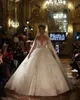 Abiti da sposa arabi sexy con perline Abito da ballo Manica intera con paillettes Abito da sposa in pizzo Lunghezza pavimento Abiti su misura s