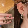 Ihålig långörhänge trendig utredning pärla strassörar för kvinnor mode smycken tillbehör