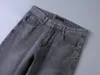 2023 dernière liste jeans skinny hommes Triangle étiquette lettres motif étiquette imprimé floral pantalon en jean hommes mode Designer Hip Hop taille 29-40