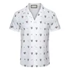 Роскошные дизайнерские рубашки Мужская мода Рубашка для боулинга с геометрическим принтом Гавайи Цветочные повседневные рубашки Мужчины Slim Fit с коротким рукавом Разнообразие тенденции