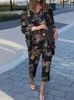 Tweede stuk broek met damesveer revers met lange mouwen met lange mouwen en brede pootbroek Pakken Casual Graphic Print Losse tweedelig set vrouwen onregelmatige shirts outfits 230330