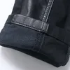 Męskie dżinsy projektant mody czarny zamek motocyklowy skórzane spodnie koreańskie szczupłe splatanie dżins 230330
