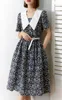 Bebek boyun elbisesi Kadın İlkbahar ve Yaz Yeni 2023 V Boyun Parçalanmış Çiçek Etek Tasarım Küçük Ağır Endüstri Uzun Elbise