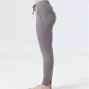 short lu Calça de corrida feminina de tecido nude para exercícios de ioga Calça feminina com cordão na cintura Calça legging fitness para ioga com bolsos laterais