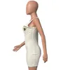 Witte bodycon -jurken voor vrouwen mouwloze zomer bijen koningin hip wrap sexy jurk dames kleding