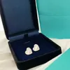 Créateur de boucles d'oreilles pour femmes en forme de coeur Stud Simple Diamond 925 Silver Valentine Wedding Gifts