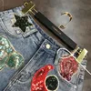 Shorts pour femmes DEAT Arrivée Lune Étoile Paillettes Brodé Gland Patch Brut Denim Shorts Femmes Mode Température Marée Femmes ME670 230330