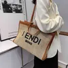 Factory direct sale High sense portable capacity woven large women's summer shoulder bag straw texture Tote Bag