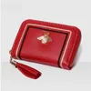 Autentisk lädertaktil Feel Clutch Multi-Card-Slot Card Holder Zipper Butterfly Decoration Document Package Coin Purse Factory Prossist