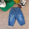 Dżinsy wiosna dzieci luźne unisex dla dzieci duże kieszeniowe dżinsowe spodnie