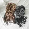 Hiver femmes écharpe léopard marque de luxe foulards dame gland Bandana femmes solide châle enveloppes Foulard Tippet Pashmina