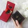 Kosmetiktaschen aus echtem Leder Frauen Tasche Make-up Tasche Reise kleine Kopfhörer Schlüssel Box Lippenstift Organizer Fall Mode Mini Geldbörse