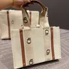 Mulheres bolsas de bolsa amadeirada Bolsa de ombro Mini Viagens Luxuris Bolsa de praia Bolsa de compras linho de moda grande designer Designer Viagem Bolsas de ombro cruzadas Bolsas de ombro Bolsa