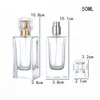 Bouteille en verre de parfum carré clair 30 ml 50 ml emballage or argent pompe de presse spary avec couvercle conteneur portable emballage rechargeable cosmétique