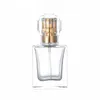 Bouteille en verre de parfum carré clair 30 ml 50 ml emballage or argent pompe de presse spary avec couvercle conteneur portable emballage rechargeable cosmétique