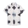 Роскошные дизайнерские рубашки Мужские модные геометрические принципиальные рубашка для боулинга Hawaii цветочные повседневные рубашки мужчины Slim Fit Eart