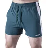 Men's Shorts Sports men's running shorts casual quick-drying summer fitness shorts solid color men's fitness jogging compression shorts W0327